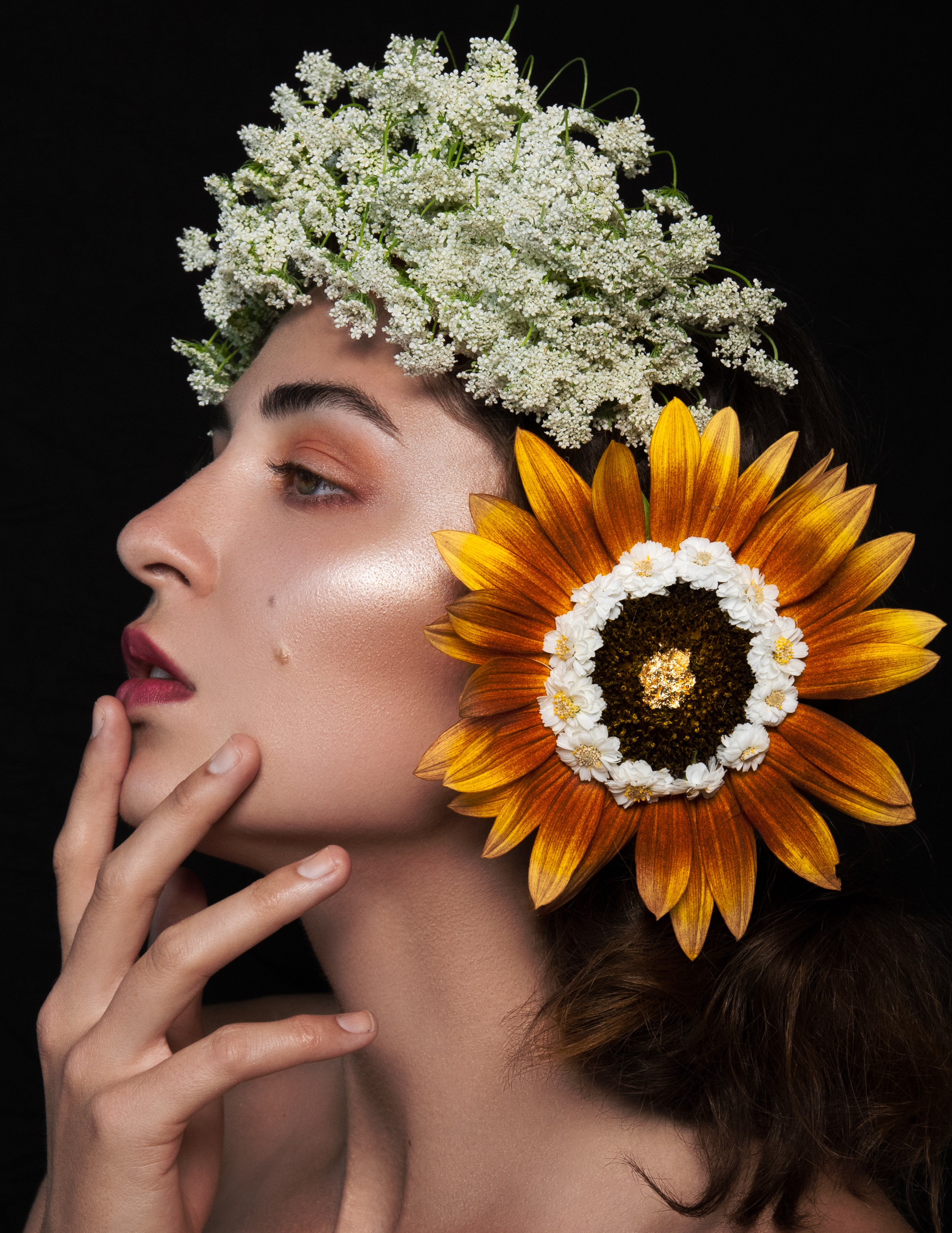 model with baby's breath crown and compound flower